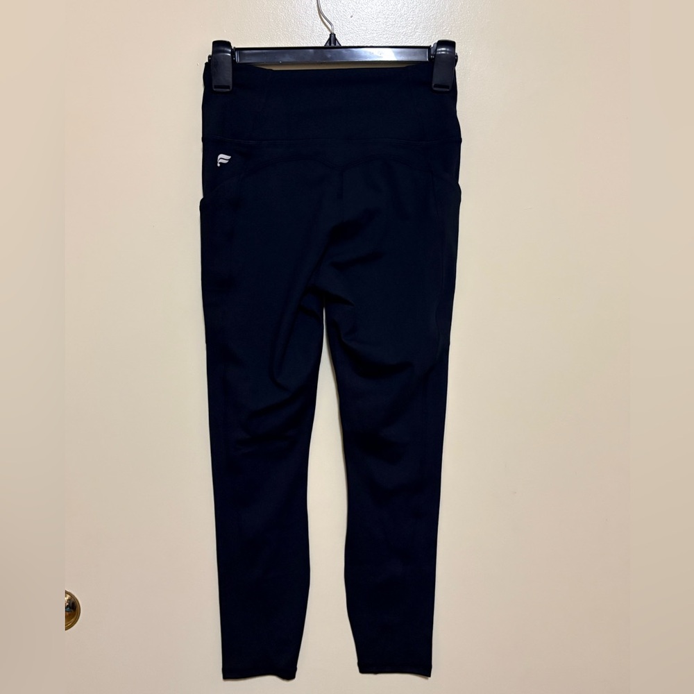 Fabletics Oasis High Waisted 7/8 Black Leggings - Picture 2 of 5